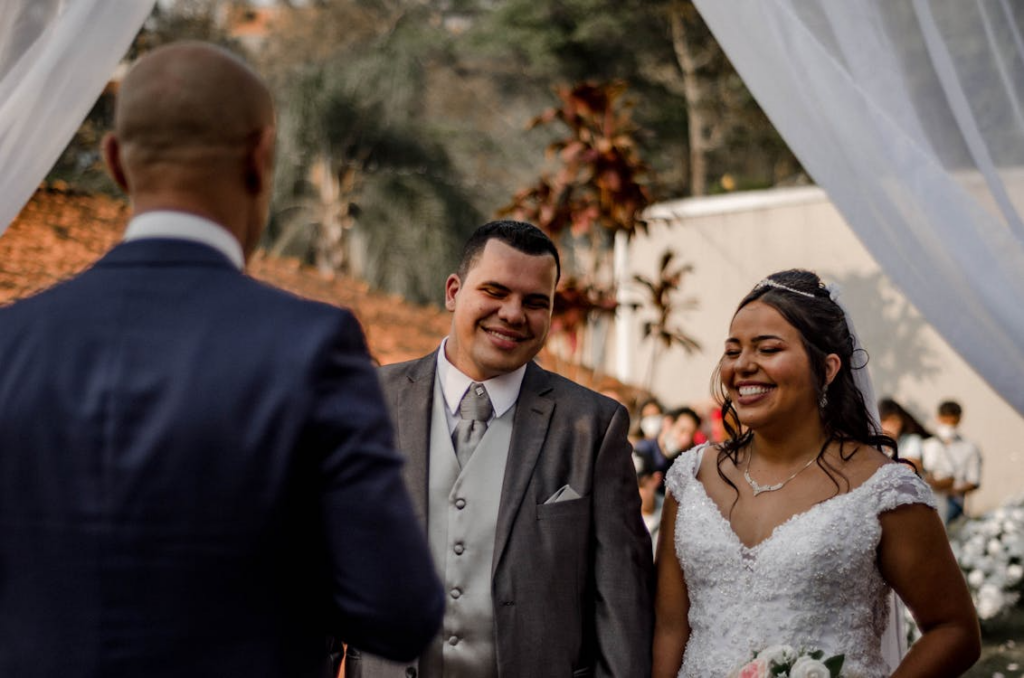 Bride and Groom Smiling during the Wedding Ceremony