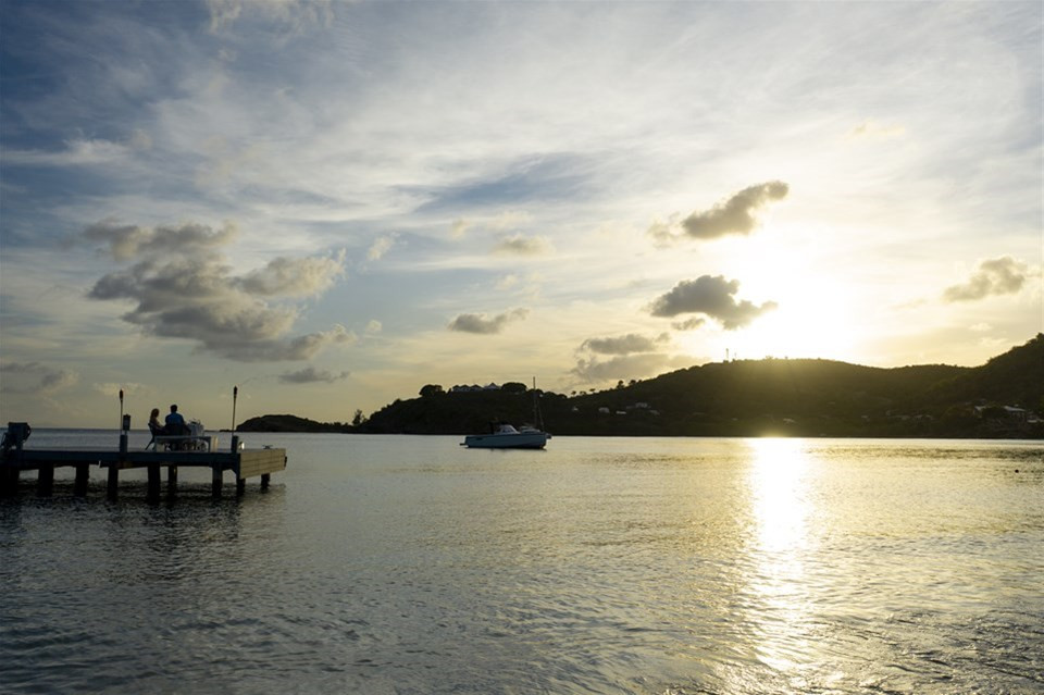 Couple on the dock at Carlisle Bay