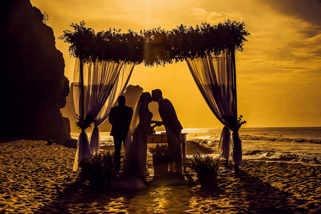 Silhouette Photography of Newly Wed Kissing on Seashore