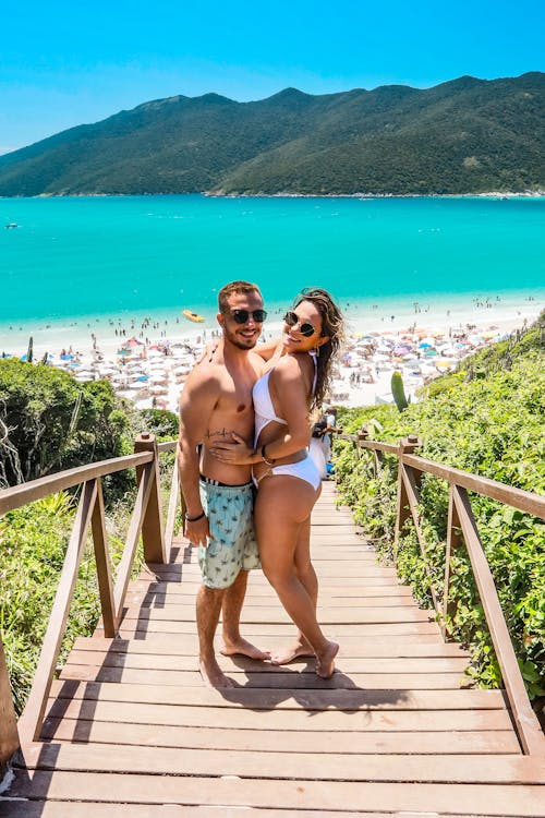 A Couple Posing on the Wooden Stairs