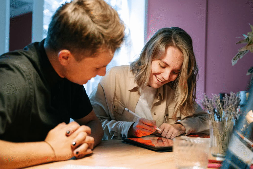 Young professionals collaborating on a project in an inspiring indoor workspace